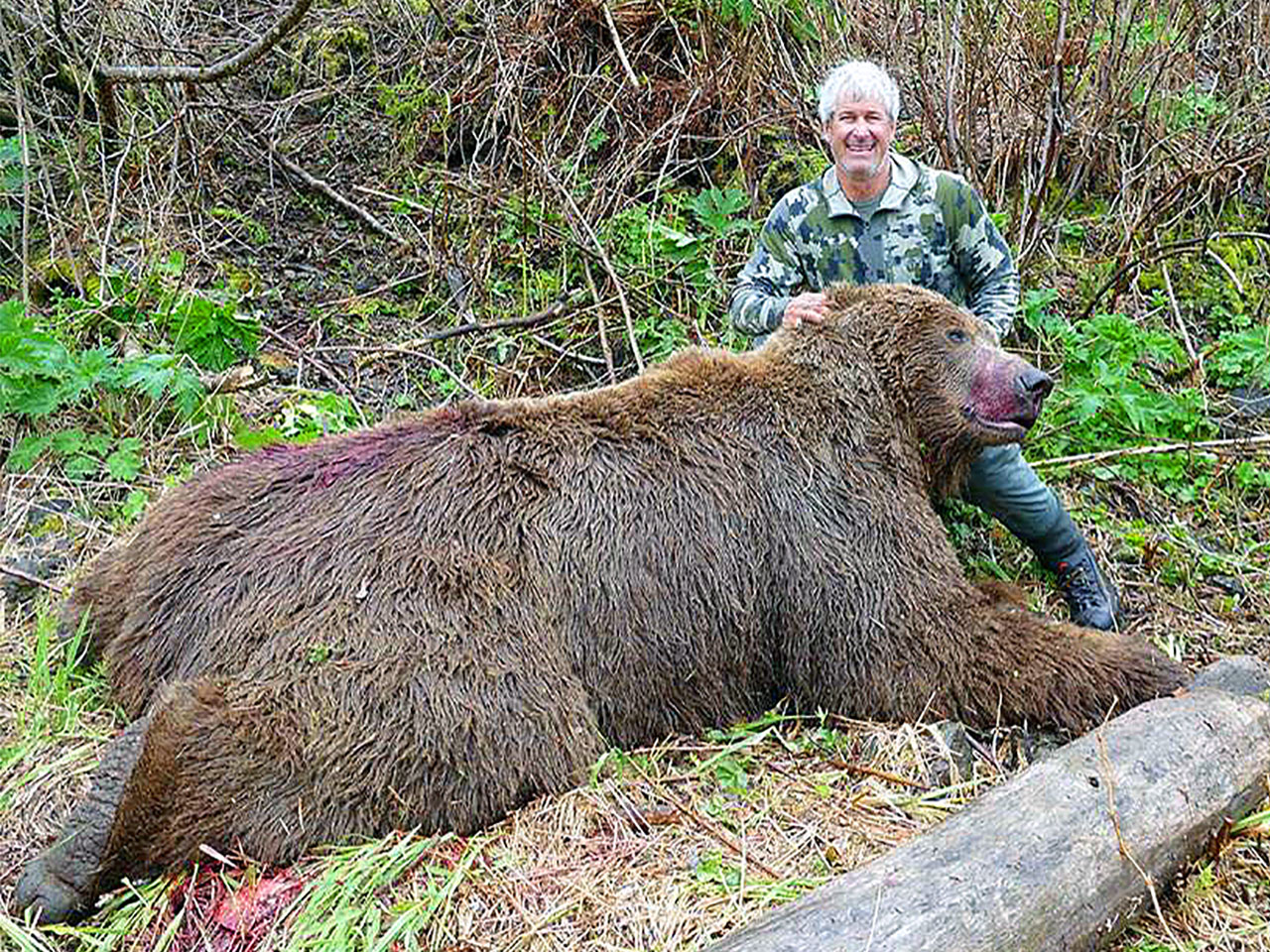 Alaska Peninsula Brown Bear Hunter with his catch