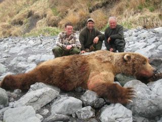 Three Hunters with a Kodiak Brown Bear